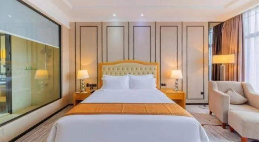 Bed in Golden Phoenix International Hotel