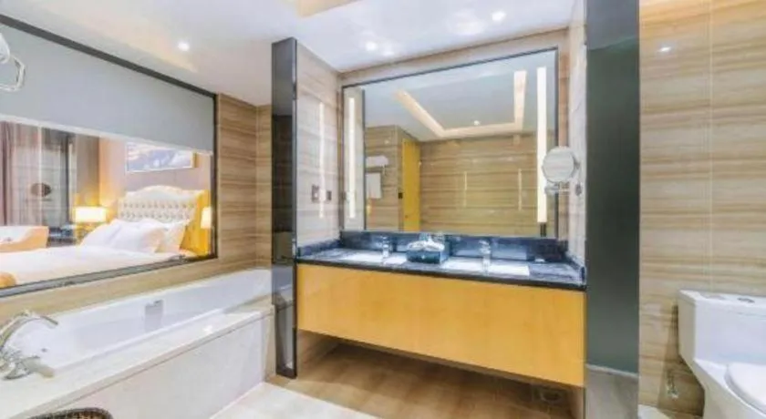 Bed in Golden Phoenix International Hotel