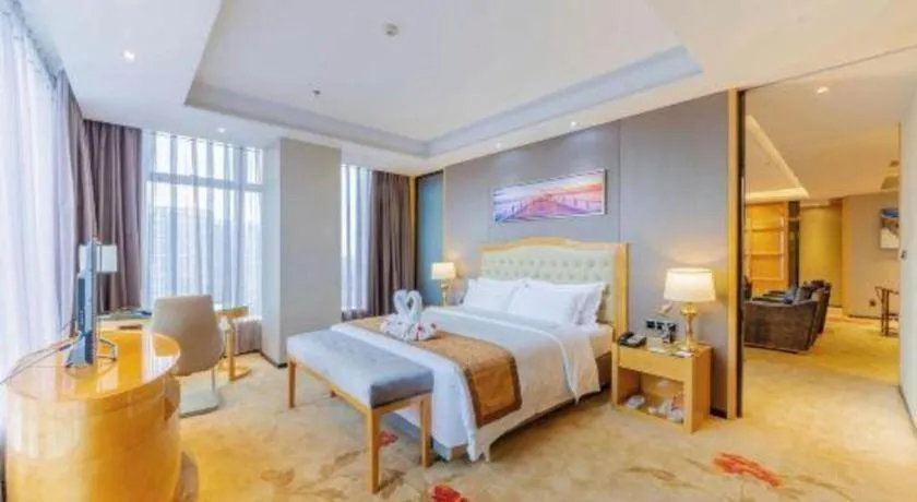 Bed in Golden Phoenix International Hotel