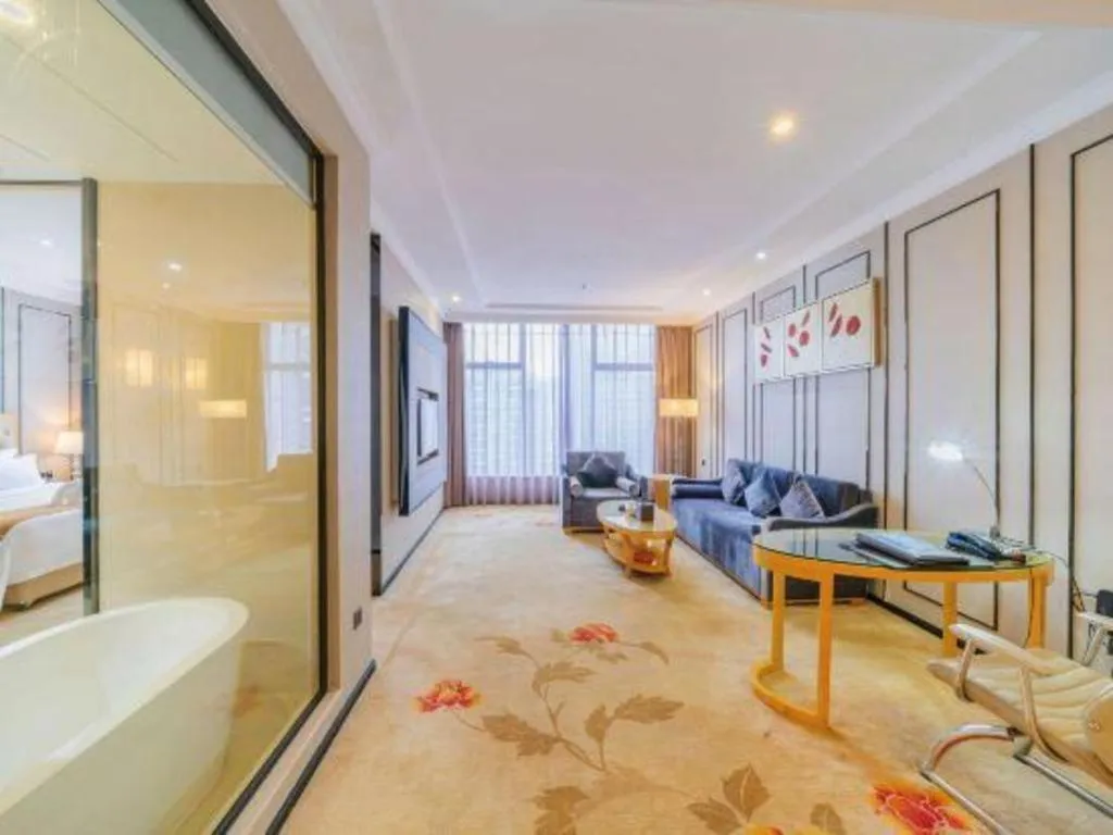 Bed in Golden Phoenix International Hotel