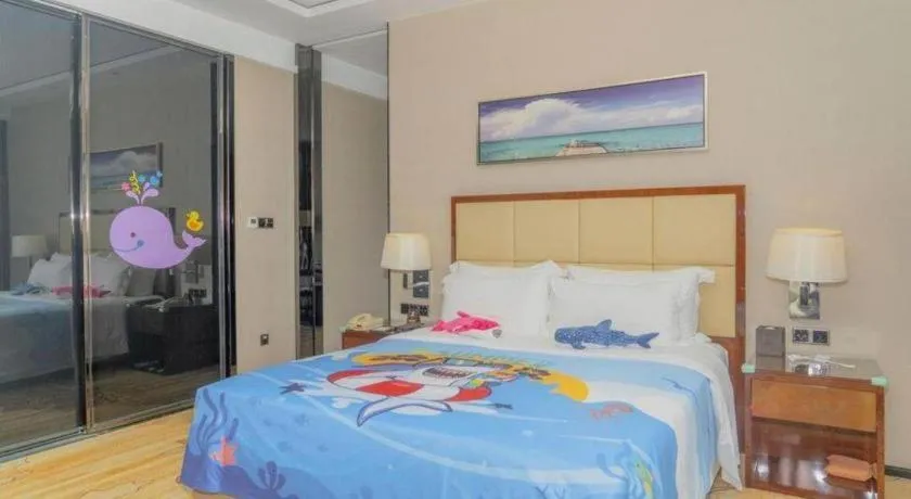 Bed in Golden Phoenix International Hotel