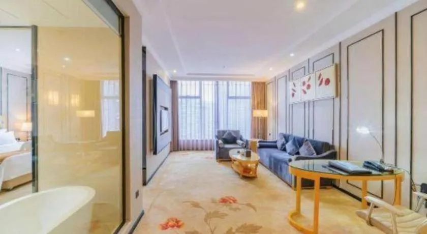 Bed in Golden Phoenix International Hotel