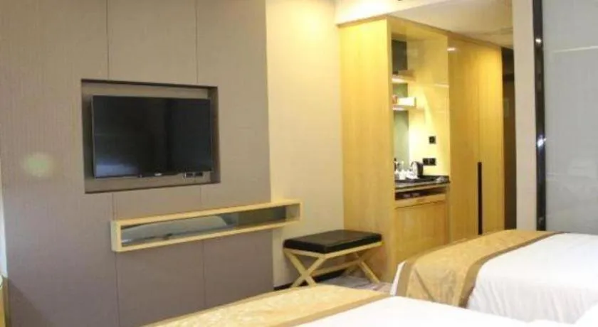 Bed in Golden Phoenix International Hotel