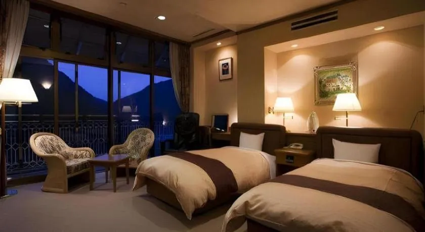 Bed in Hotel Hikyounoyu