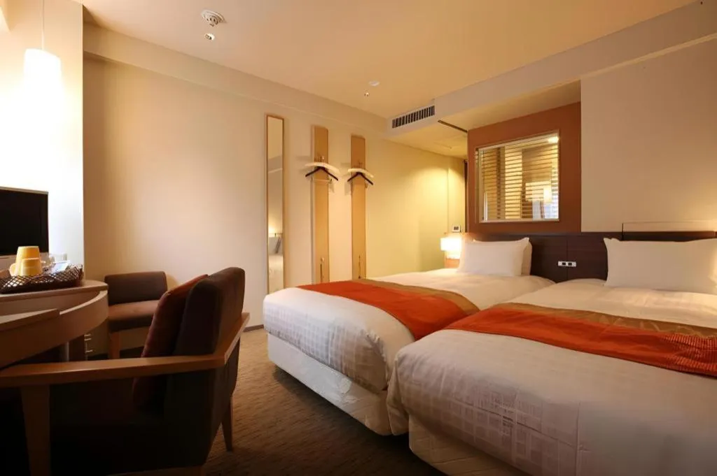 Bed in Ochanomizu Hotel Juraku