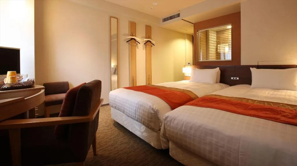 Bed in Ochanomizu Hotel Juraku