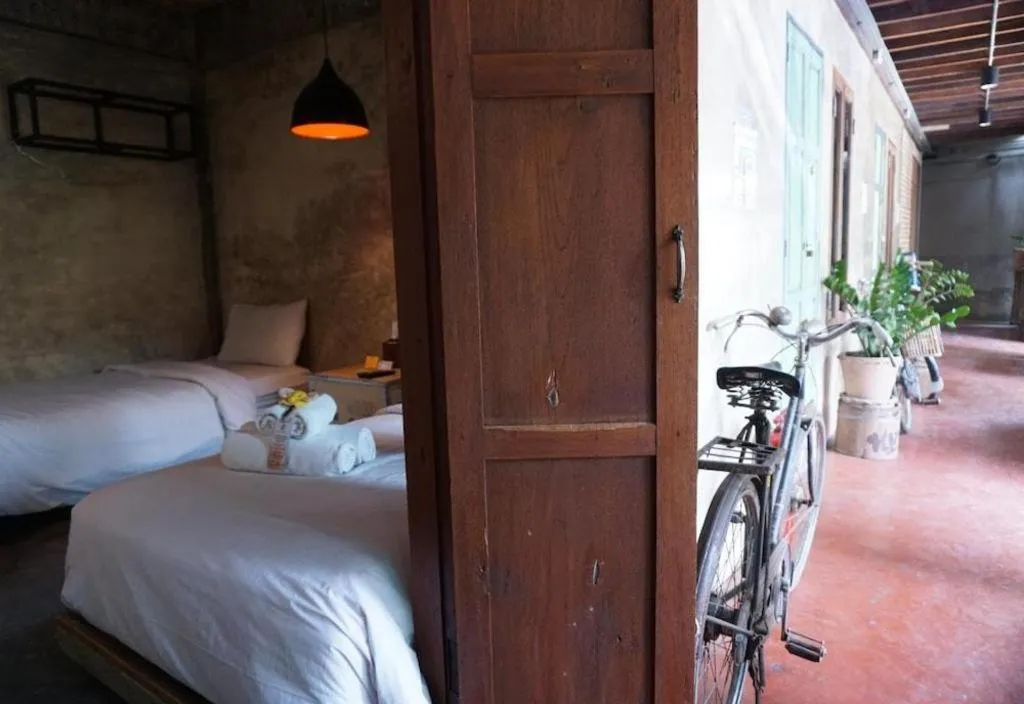 Bed in Huen Chang Puek Hotel