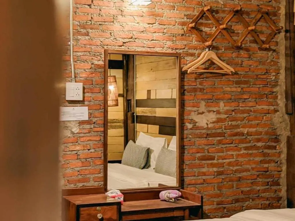 Bed in Huen Chang Puek Hotel