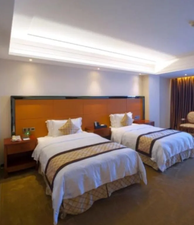 Bed in Auspicious Hotel