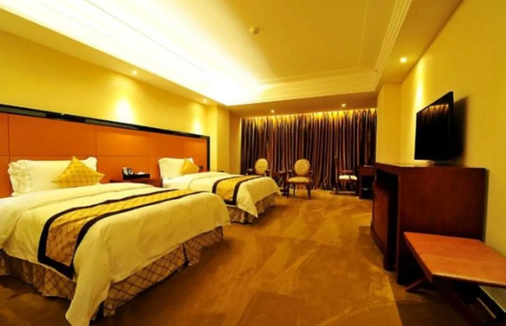 Bed in Auspicious Hotel