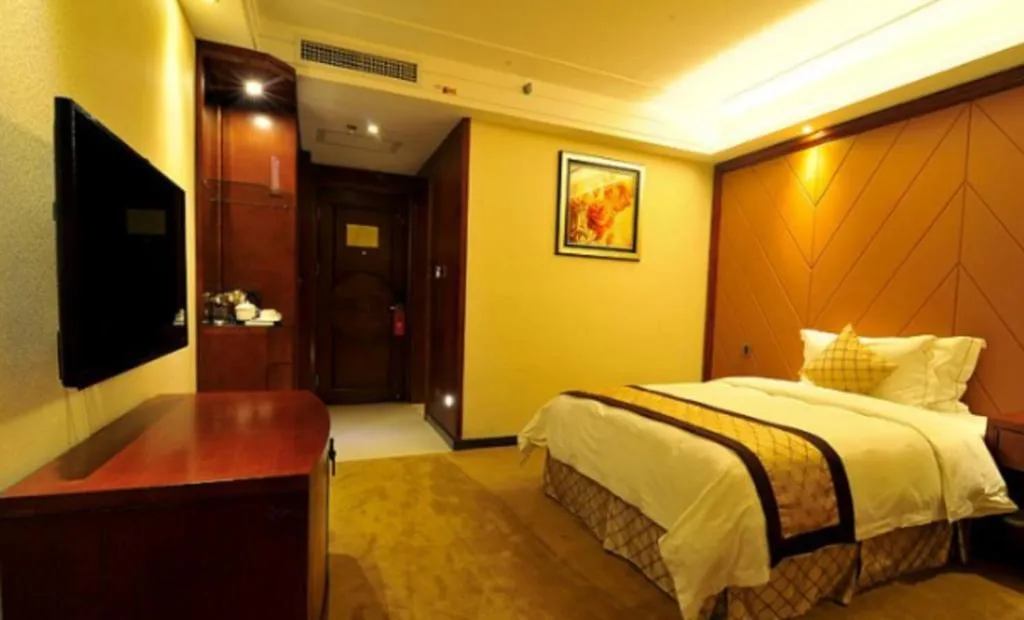 Bed in Auspicious Hotel