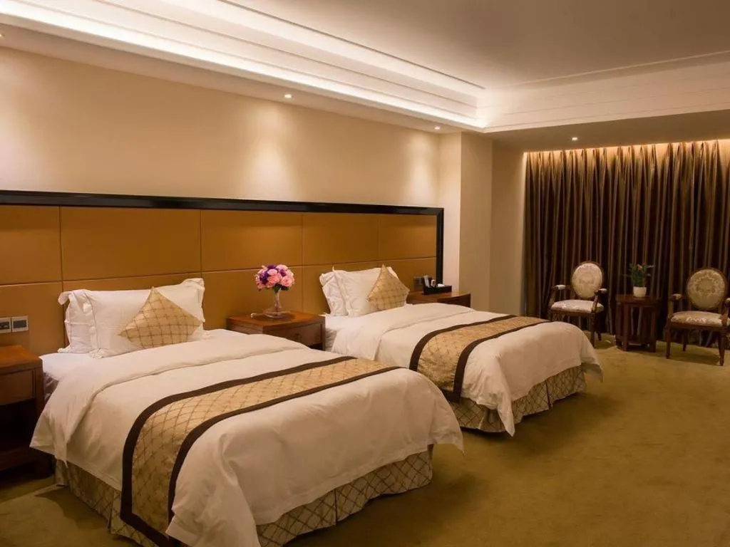 Bed in Auspicious Hotel