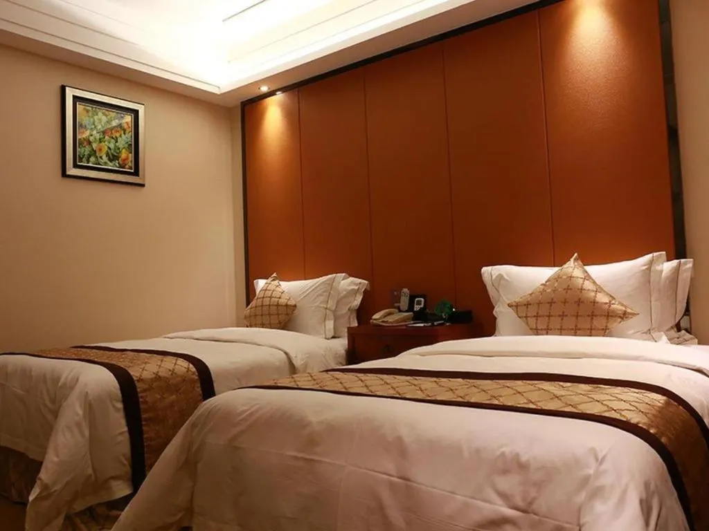 Bed in Auspicious Hotel