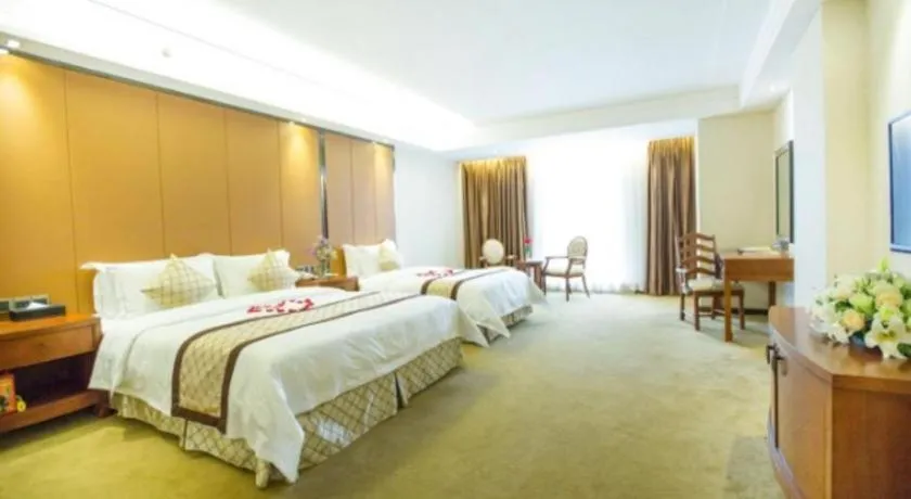 Bed in Auspicious Hotel