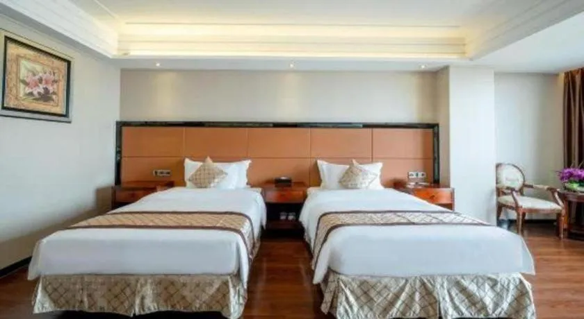 Bed in Auspicious Hotel