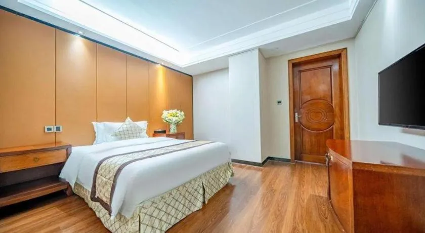 Bed in Auspicious Hotel