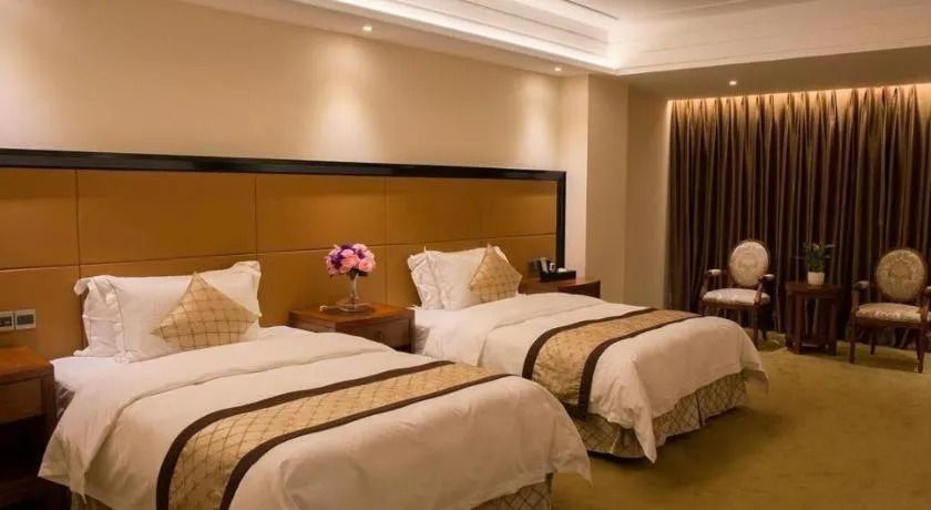 Bed in Auspicious Hotel