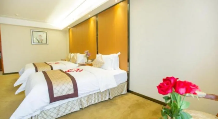 Bed in Auspicious Hotel