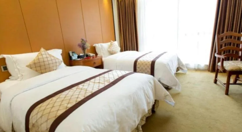 Bed in Auspicious Hotel