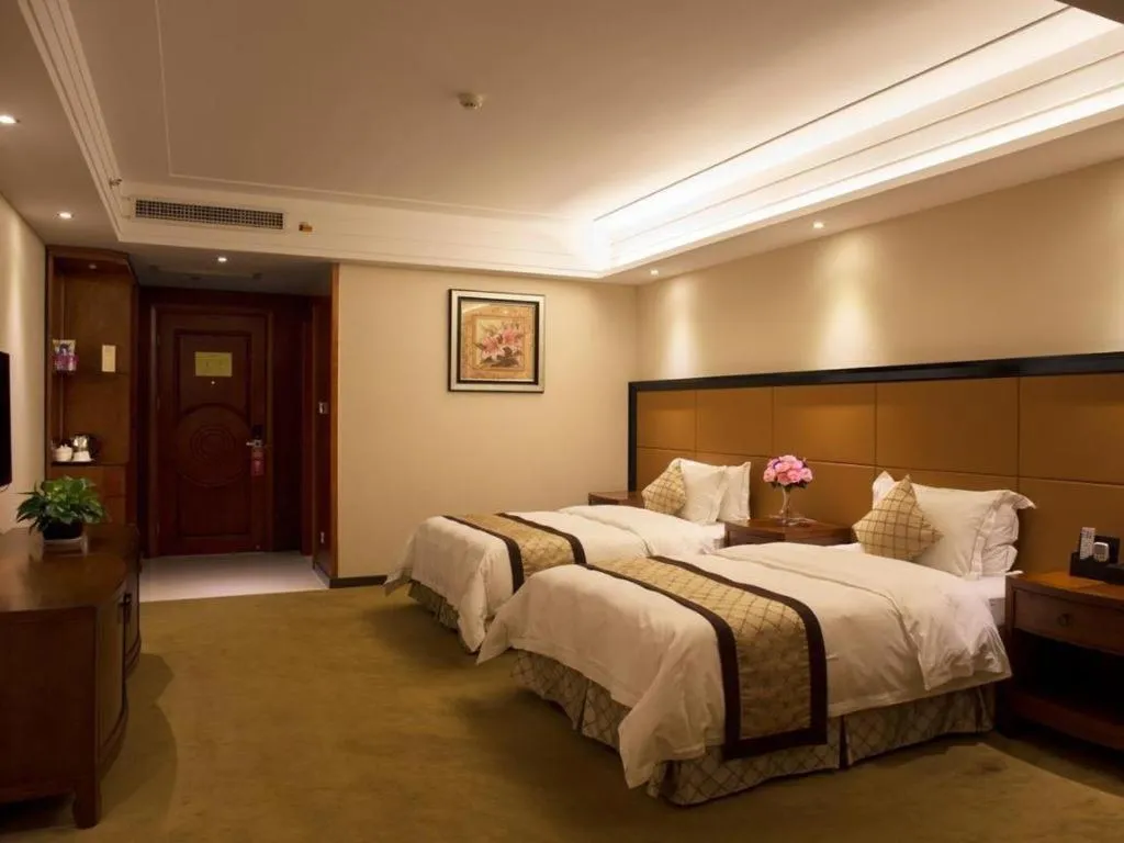Bed in Auspicious Hotel