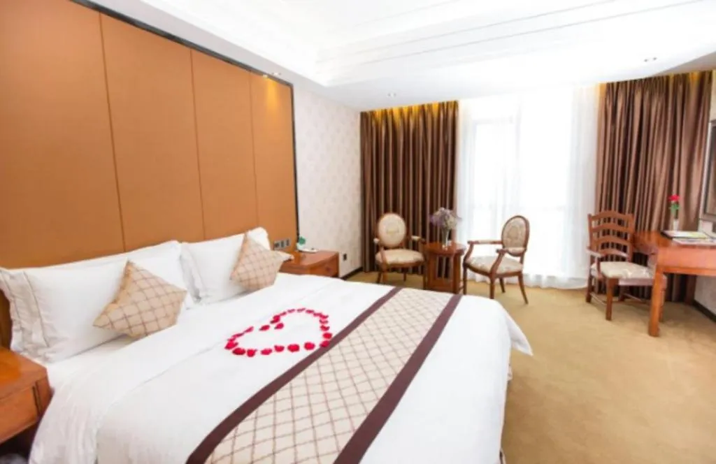 Bed in Auspicious Hotel