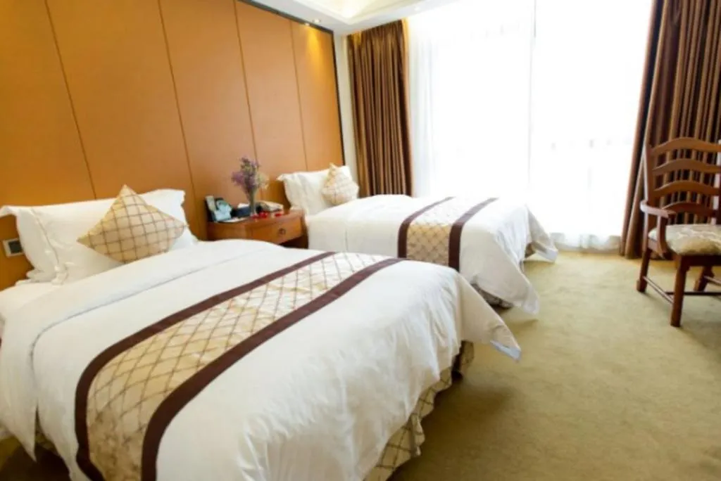 Bed in Auspicious Hotel