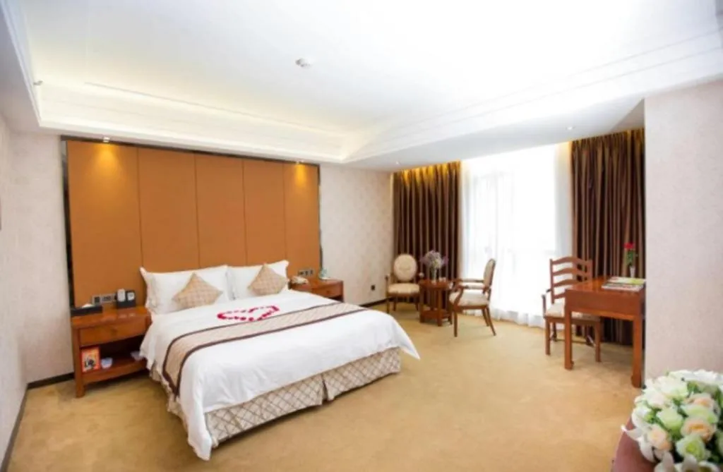 Bed in Auspicious Hotel