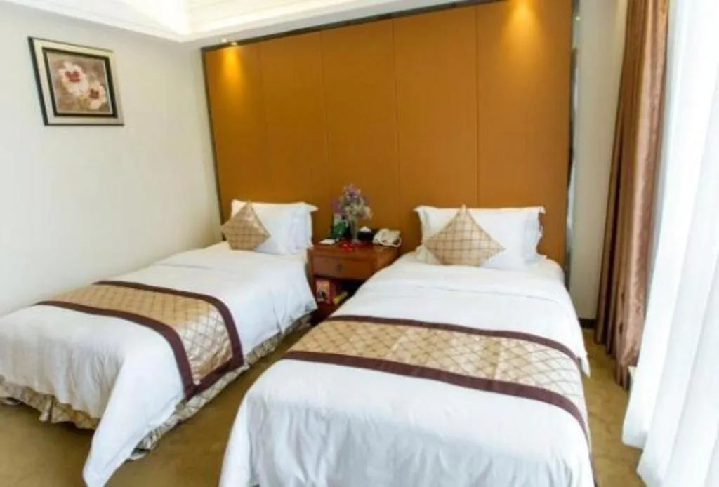 Bed in Auspicious Hotel