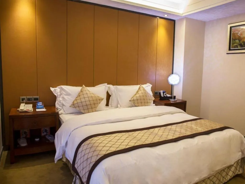 Bed in Auspicious Hotel