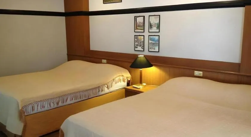 Bed in Numsin Hotel