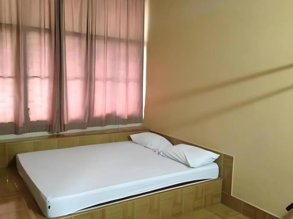 Bed in Numsin Hotel