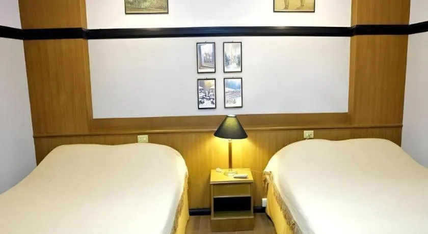 Bed in Numsin Hotel