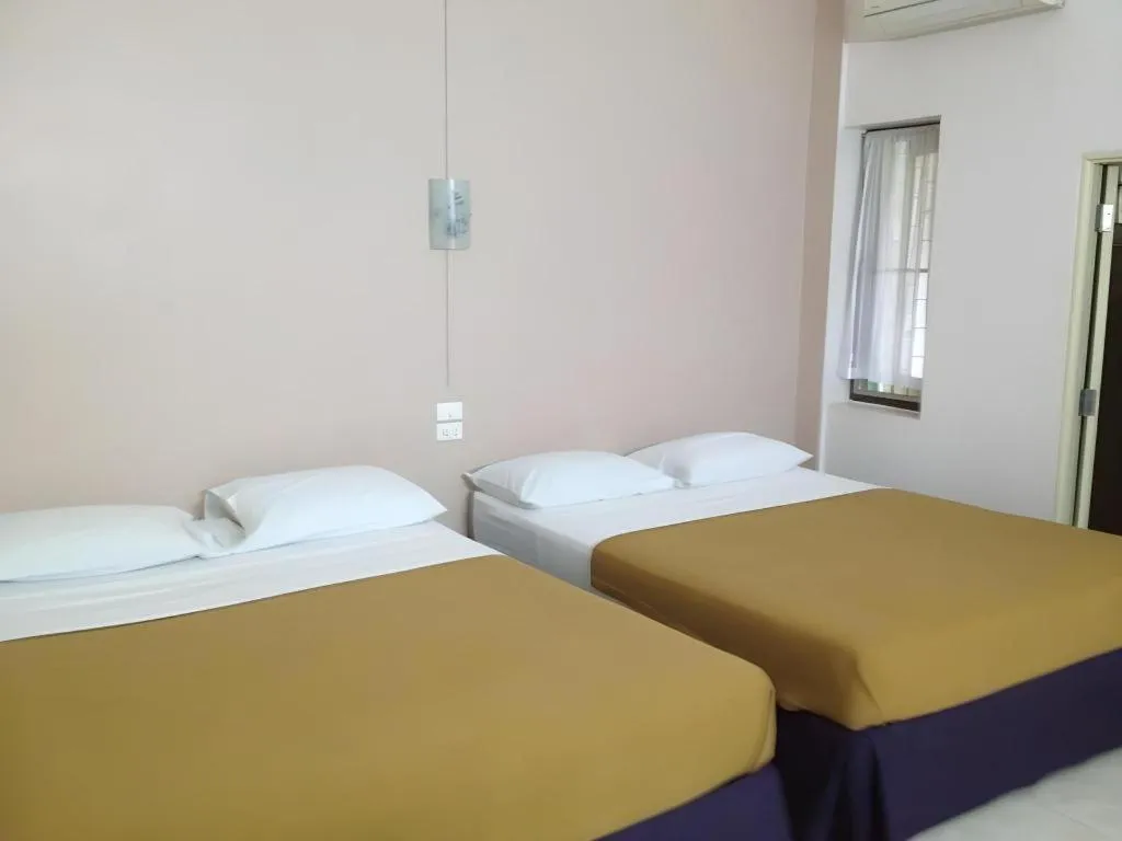 Bed in Numsin Hotel