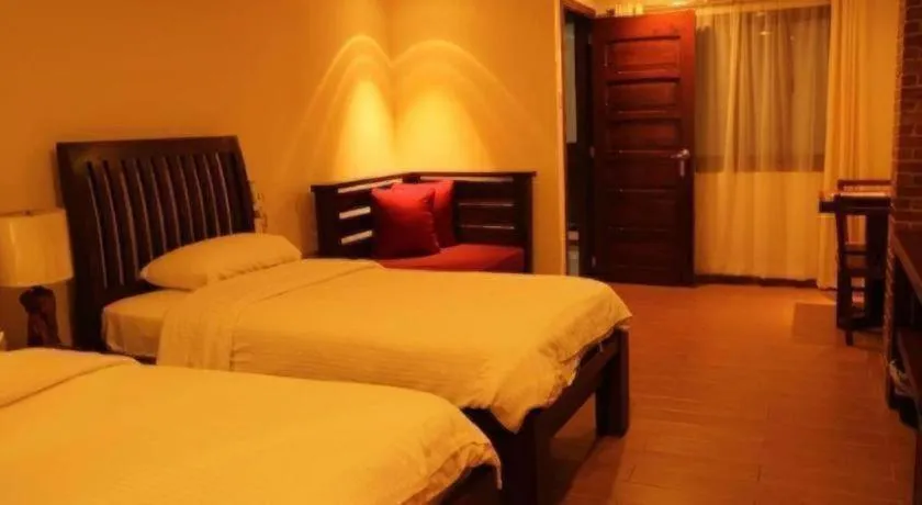 Bed in Mango Valley Hotel