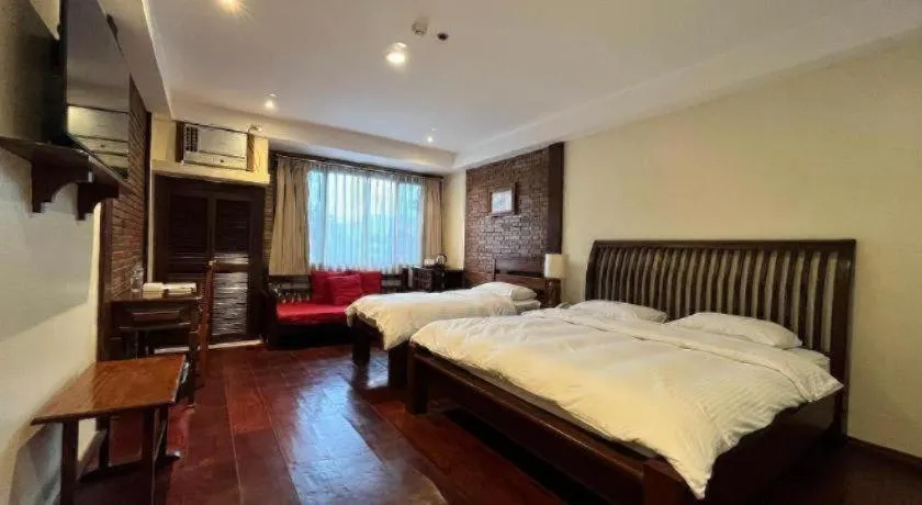 Bed in Mango Valley Hotel