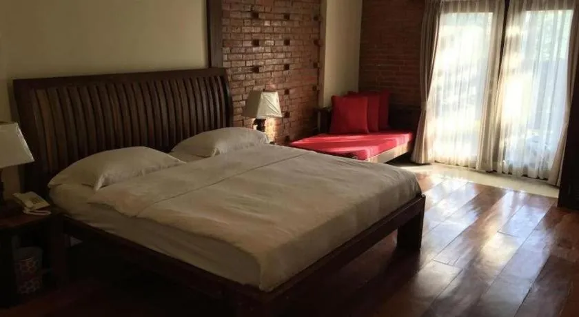Bed in Mango Valley Hotel