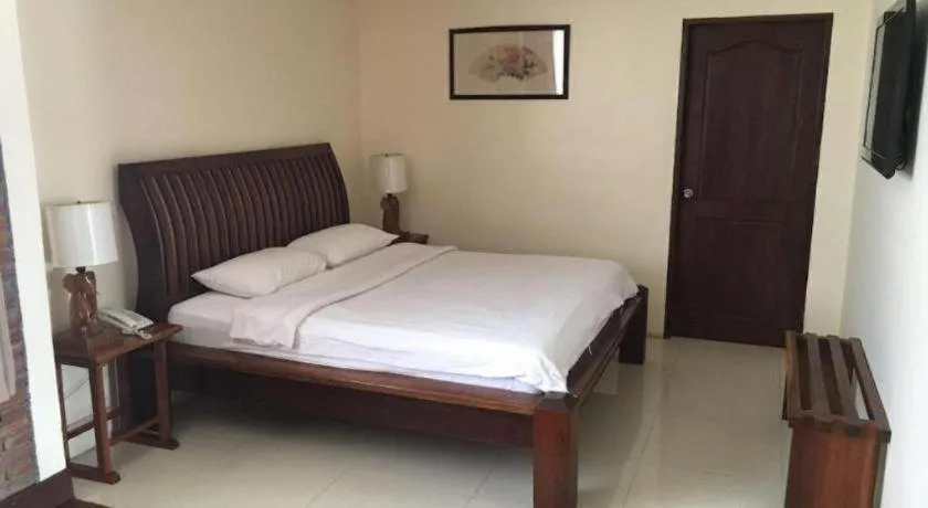 Bed in Mango Valley Hotel