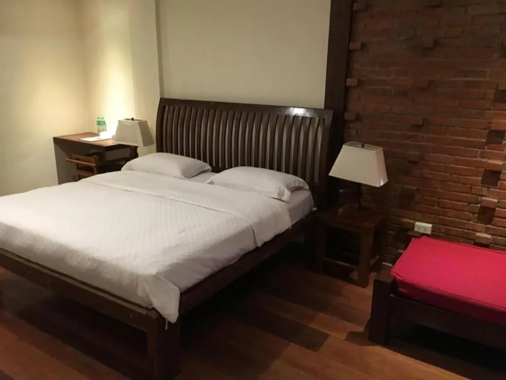 Bed in Mango Valley Hotel