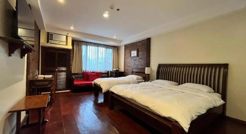 Bed in Mango Valley Hotel