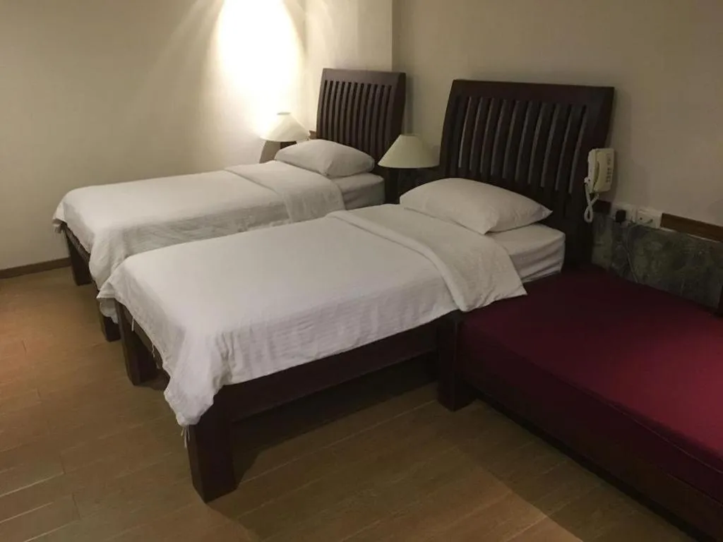 Bed in Mango Valley Hotel