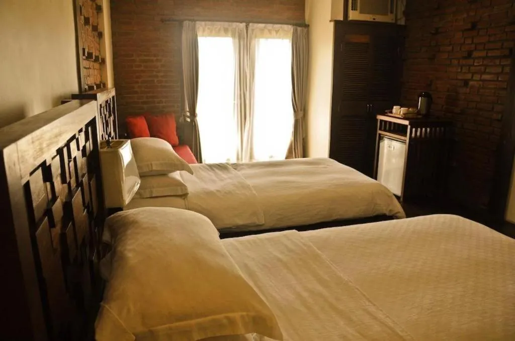 Bed in Mango Valley Hotel