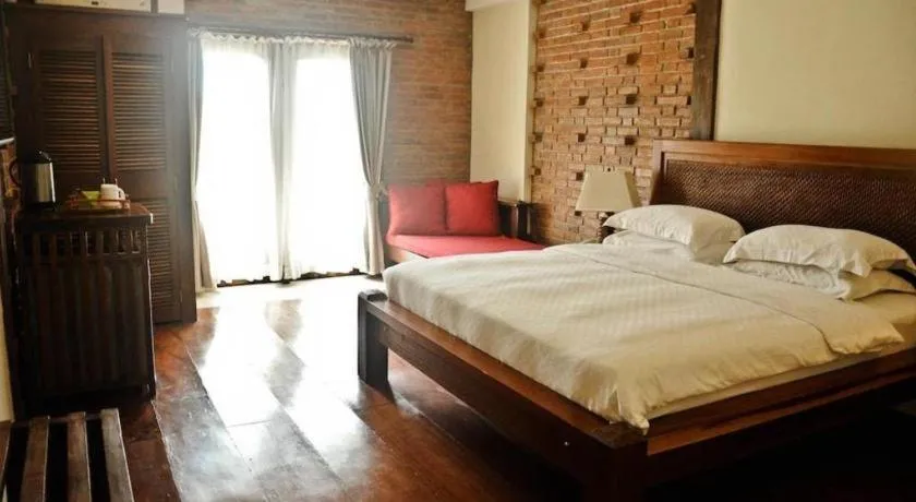Bed in Mango Valley Hotel