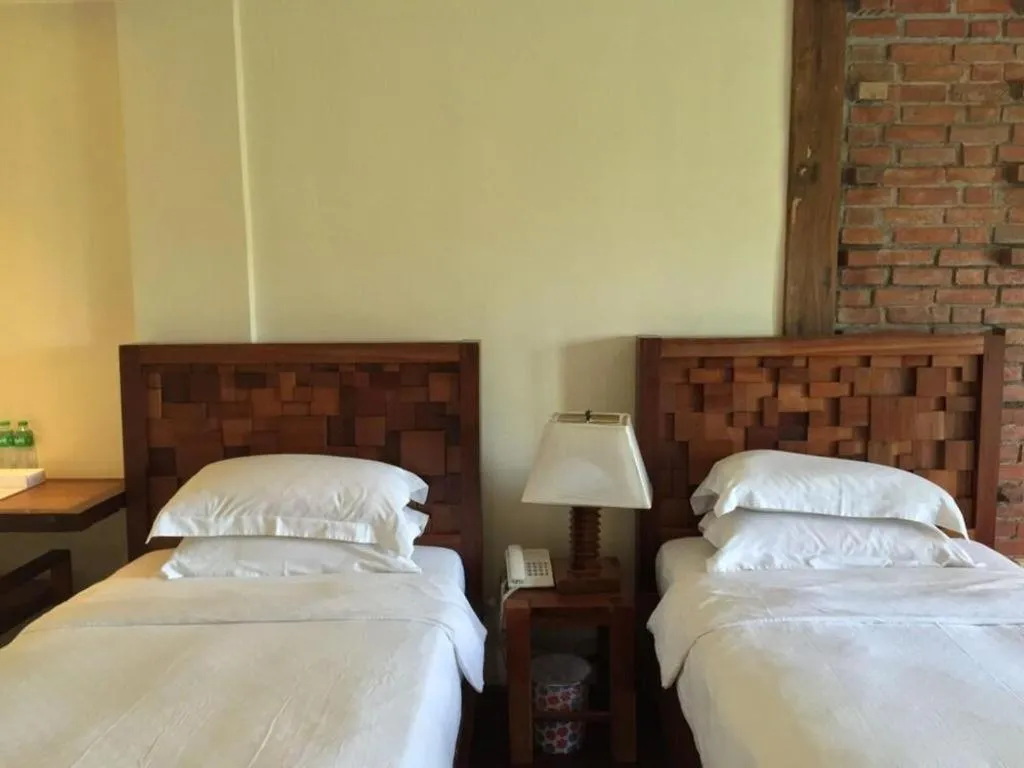 Bed in Mango Valley Hotel