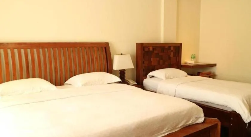Bed in Mango Valley Hotel
