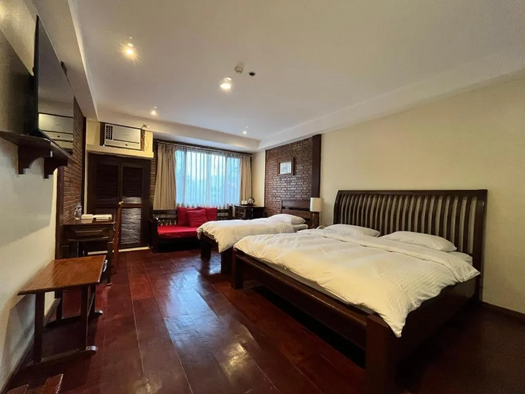 Bed in Mango Valley Hotel