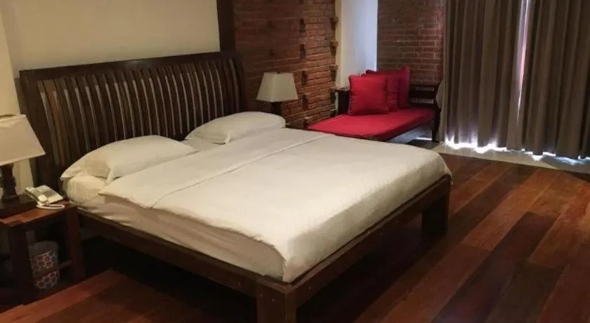 Bed in Mango Valley Hotel
