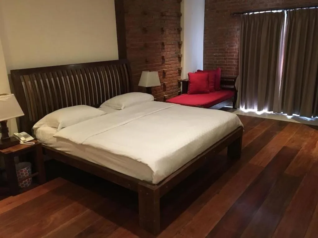 Bed in Mango Valley Hotel
