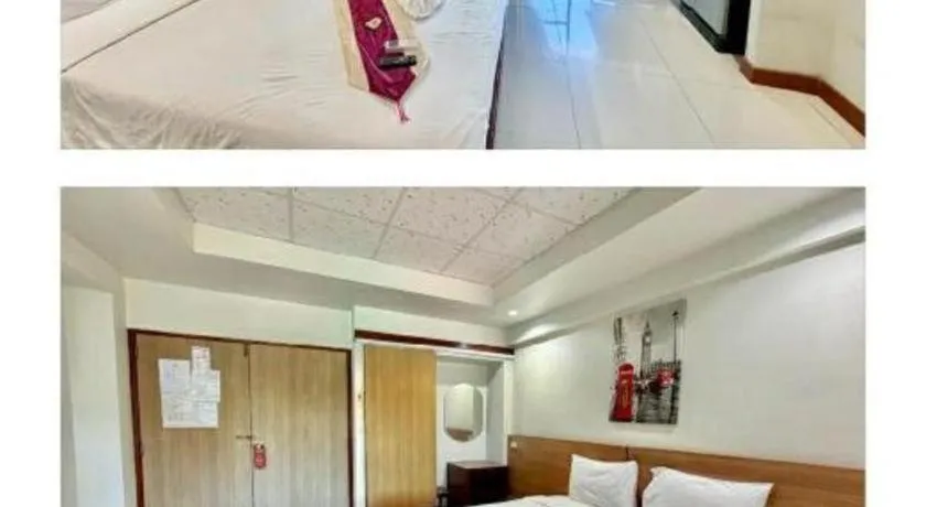 Bed in Century Grand Hotel