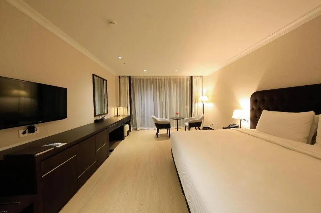 Bed in Jeju Booyoung Hotel