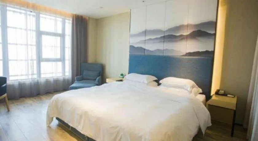 Bed in Qingdao Elegance Hotel